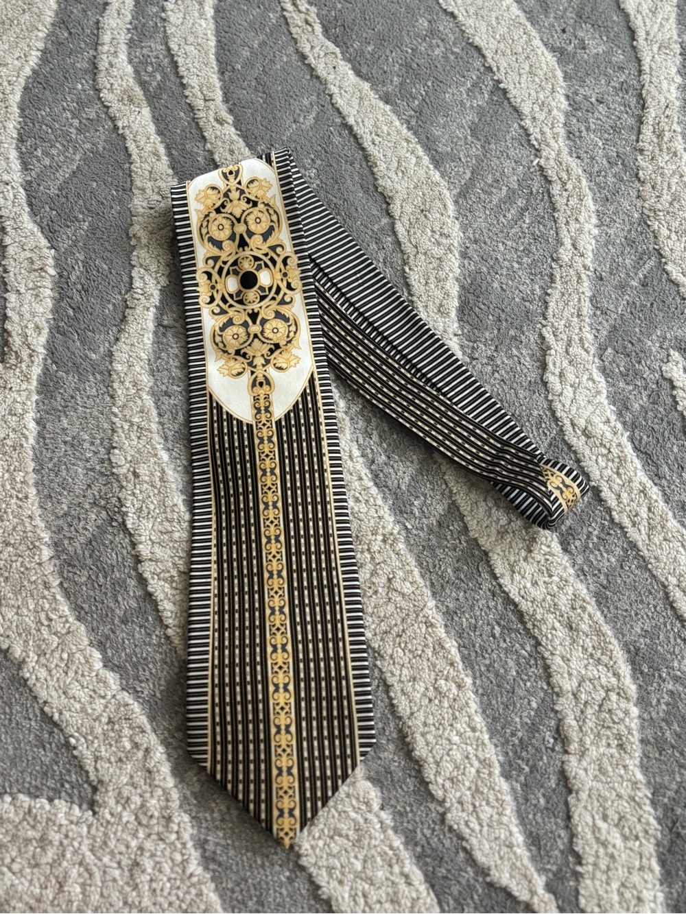 Valentino Rudy Black and Gold Striped Tie with Ornate Medallion
